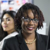 Young black female working at her computer in an office